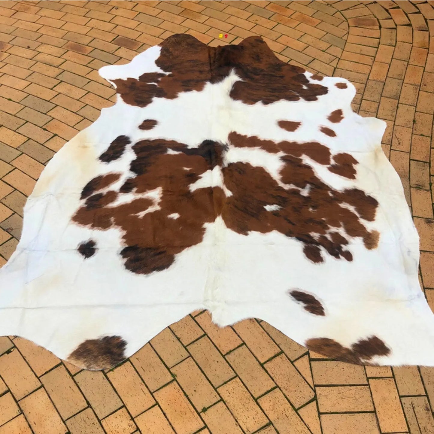 Handmade Brown White Cowhide Rug - Cowhide Kingdom