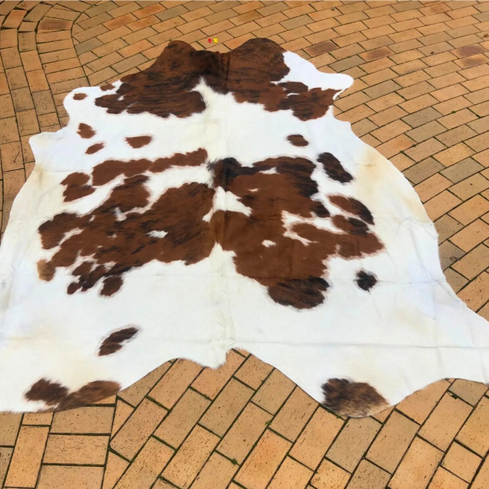 Handmade Brown White Cowhide Rug - Cowhide Kingdom