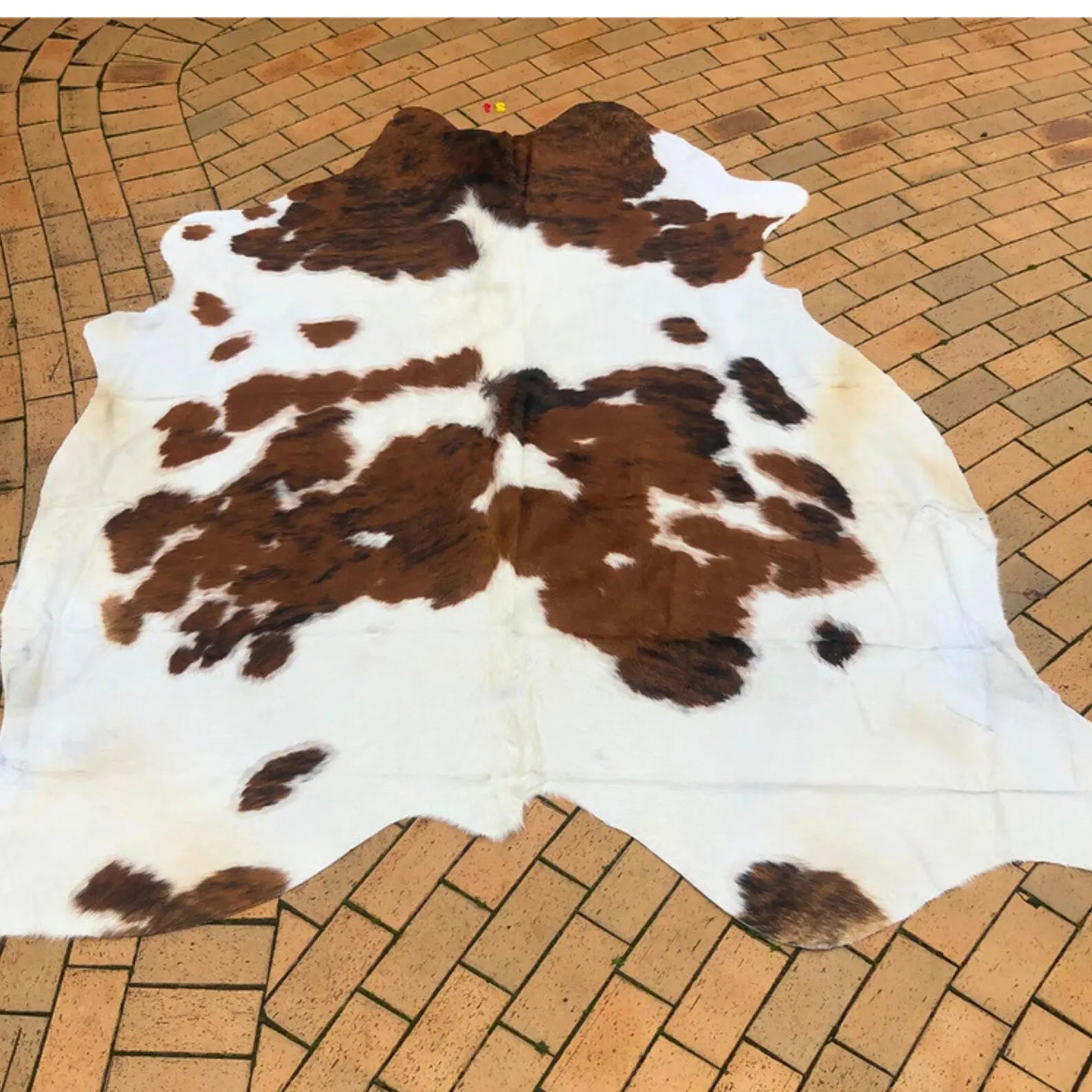 Handmade Brown White Cowhide Rug - Cowhide Kingdom