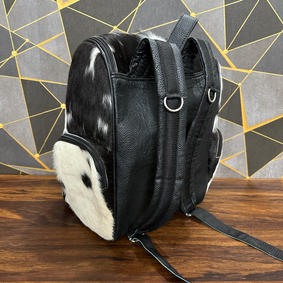Boho cowhide leather backpack for women – showing leather straps