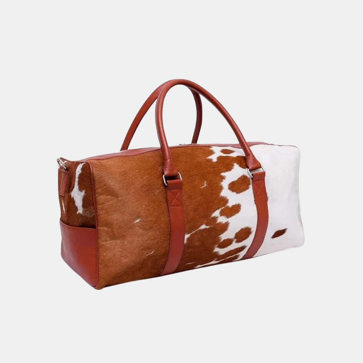 Close-up of genuine cowhide pattern on handmade duffel bag