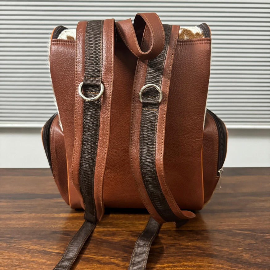Cowhide backpack back view with adjustable full-grain leather straps