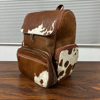 Cowhide backpack interior compartment with laptop and organizer pockets