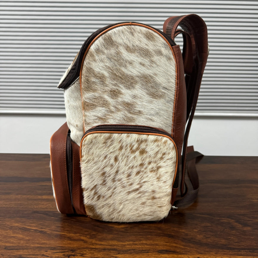 Cowhide backpack right side view with adjustable full-grain leather straps