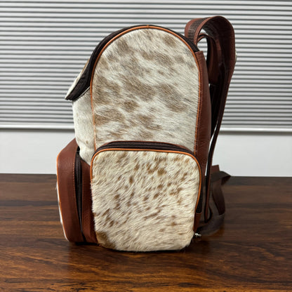Cowhide backpack right side view with adjustable full-grain leather straps