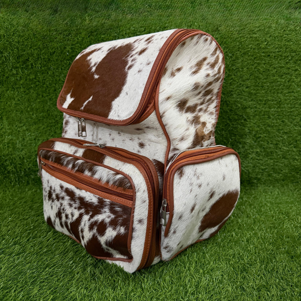 Cowhide backpack side profile showing adjustable straps