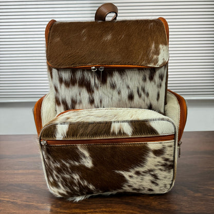Cowhide diaper backpack front view, brown and white pattern