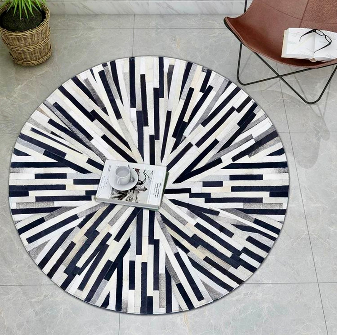 Black and white cowhide patchwork rug with custom photo approval