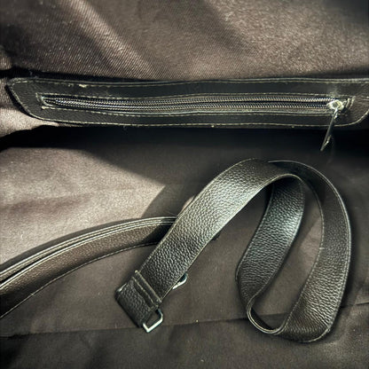 Adjustable shoulder strap for brown and white cowhide duffel bag