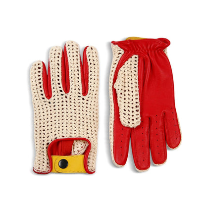 A pair of knit and leather driving gloves shown from both the back and palm sides on a plain white background. The gloves feature a cream-colored open-knit back with red trim, red leather palms, and a yellow wrist strap with a black snap button.