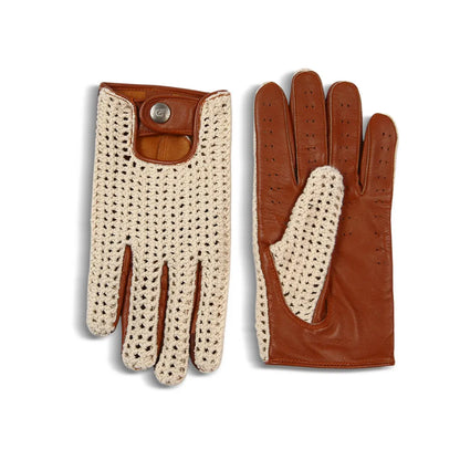 A pair of luxury leather and crocheted gloves shown flat against a white background. One glove displays the back with a cream-colored open-knit palm and brown leather finger sections and cuff, featuring a snap-button closure.