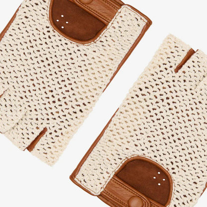 A pair of cream-colored open-knit fingerless gloves with brown leather accents, shown on a clean white background.