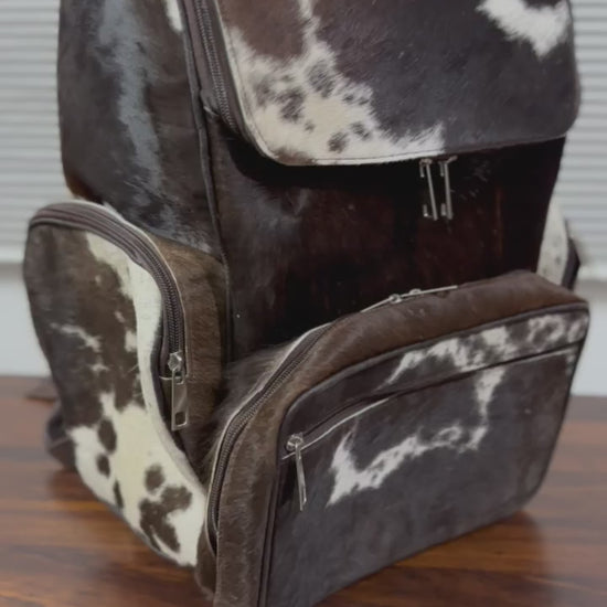 360 veiw of Cowhide leather backpack black white multi-pocket close-up