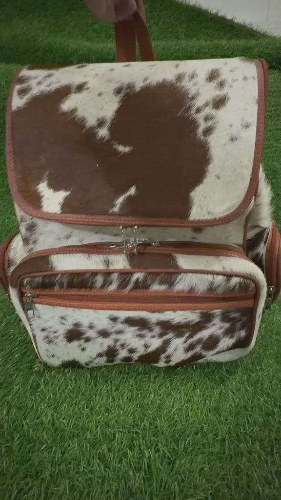 360 veiw of Cowhide leather backpack brown white speckled with tan trim