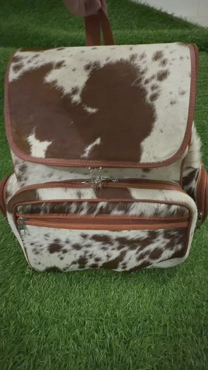 360 veiw of Cowhide leather backpack brown white speckled with tan trim