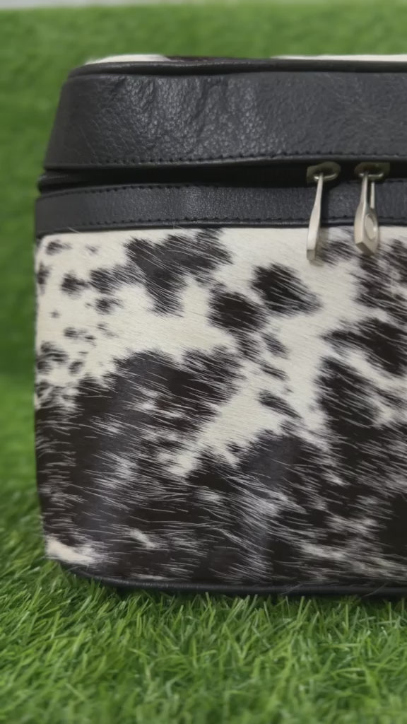 360 view of Cowhide leather cosmetic bag black white speckled with black leather trim