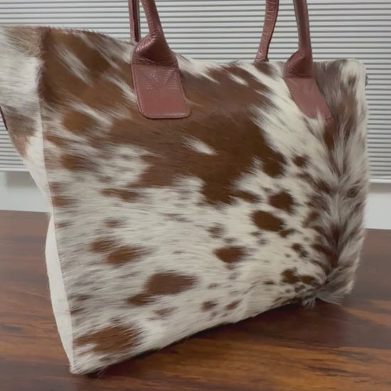 360 veiw of Cowhide leather tote bag brown white swirl with tan handles