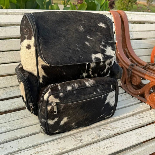 Rustic Western cowhide bag for work and school | large cowhide backpack with laptop compartment | bohemian cowhide and leather backpack for women - Cowhide Kingdom