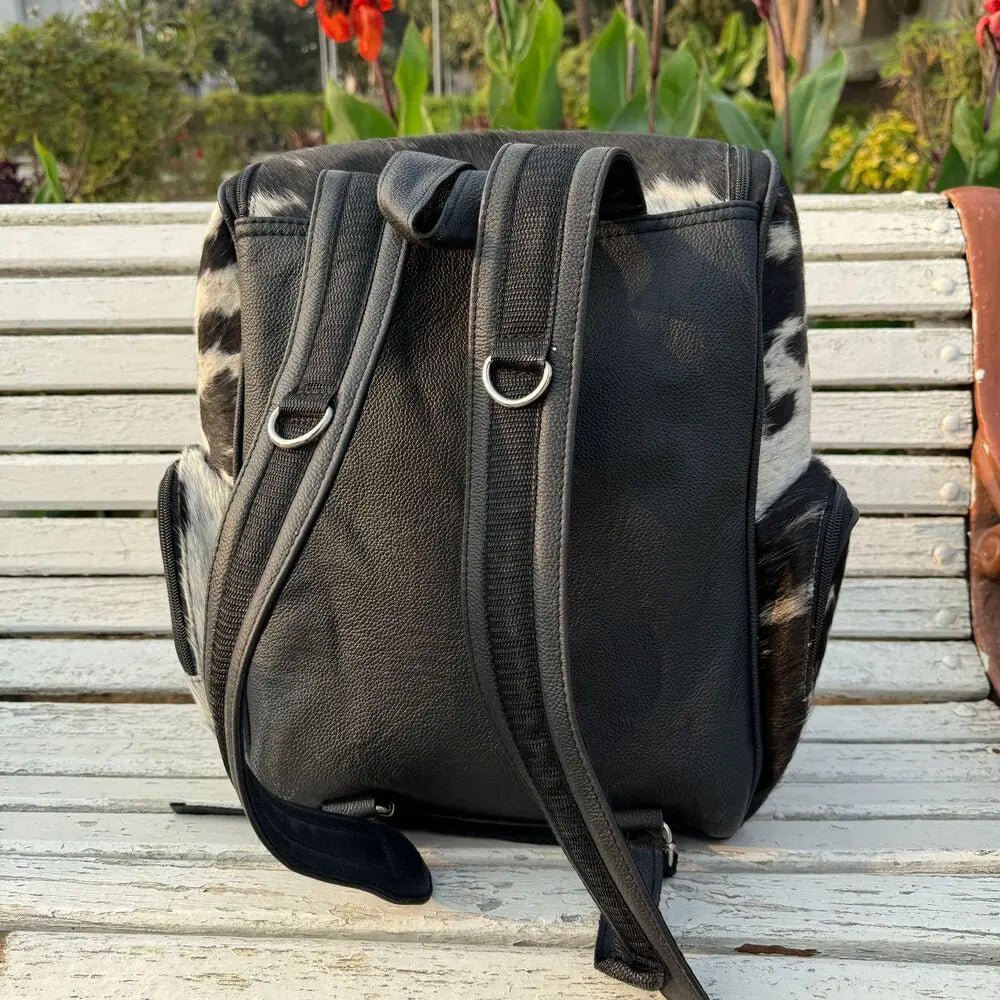 Rustic Western cowhide bag for work and school | large cowhide backpack with laptop compartment | bohemian cowhide and leather backpack for women - Cowhide Kingdom