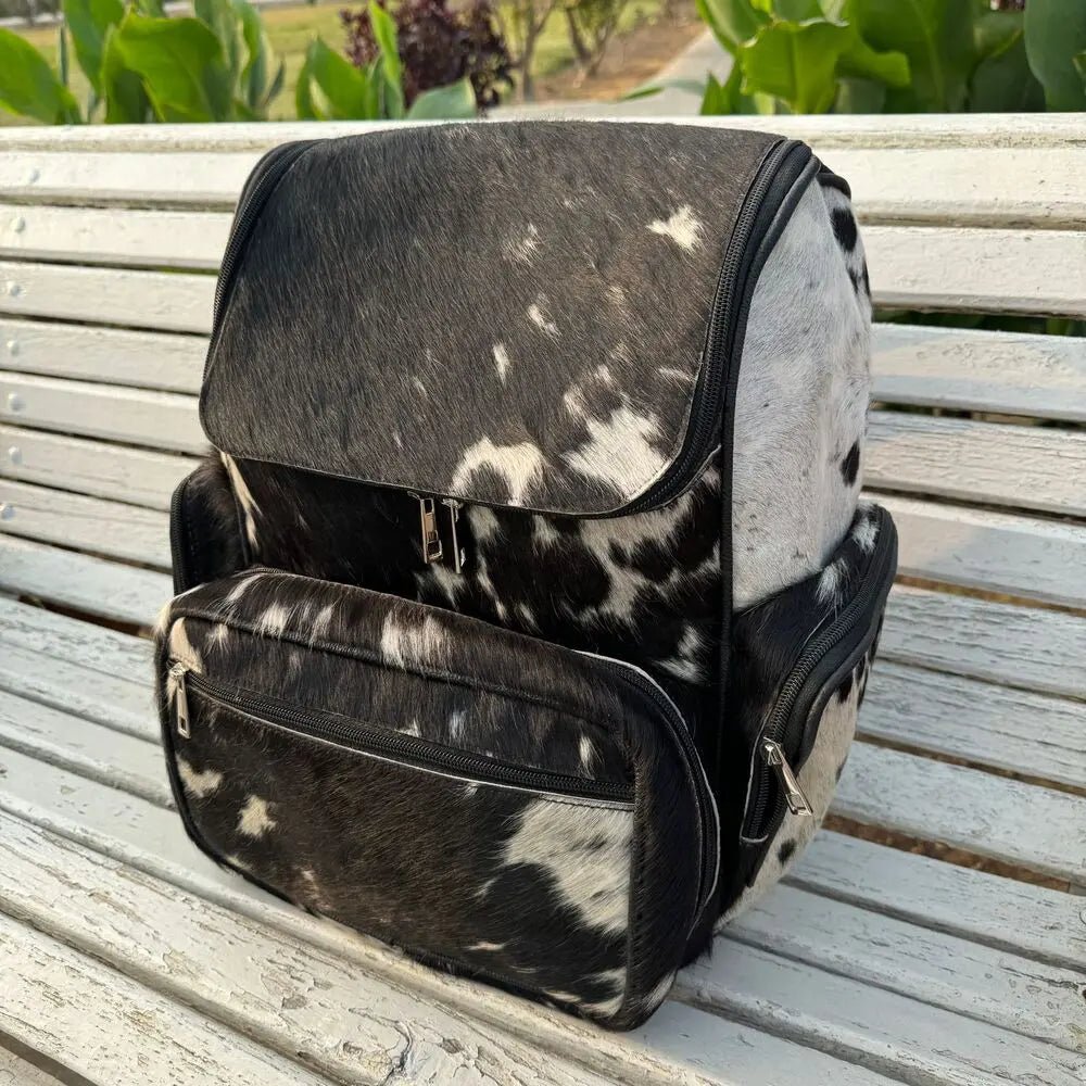 Rustic Western cowhide bag for work and school | large cowhide backpack with laptop compartment | bohemian cowhide and leather backpack for women - Cowhide Kingdom
