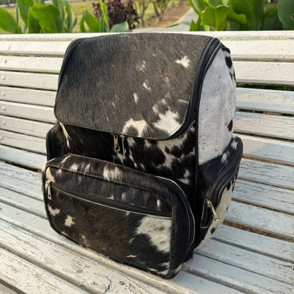 Rustic Western cowhide bag for work and school | large cowhide backpack with laptop compartment | bohemian cowhide and leather backpack for women - Cowhide Kingdom