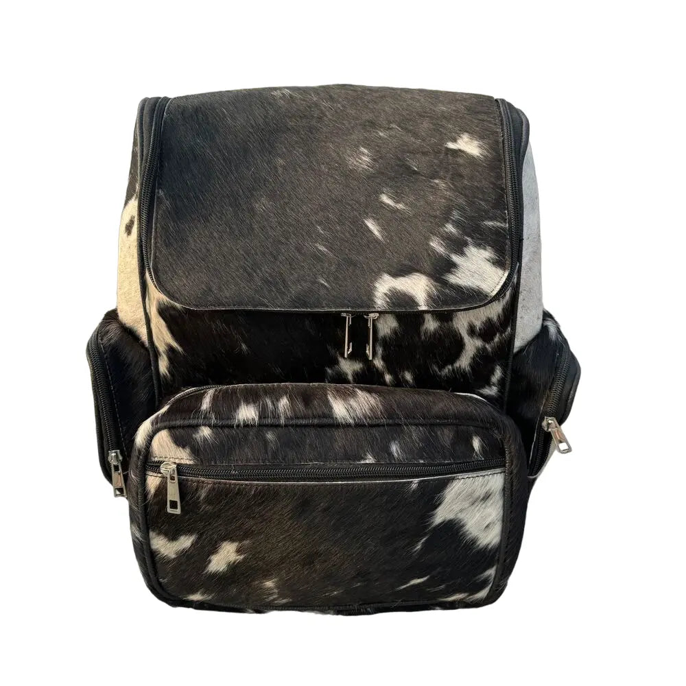 Rustic Western cowhide bag for work and school | large cowhide backpack with laptop compartment | bohemian cowhide and leather backpack for women - Cowhide Kingdom