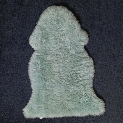 Sky blue grey single pelt sheepskin rug showing its natural shape